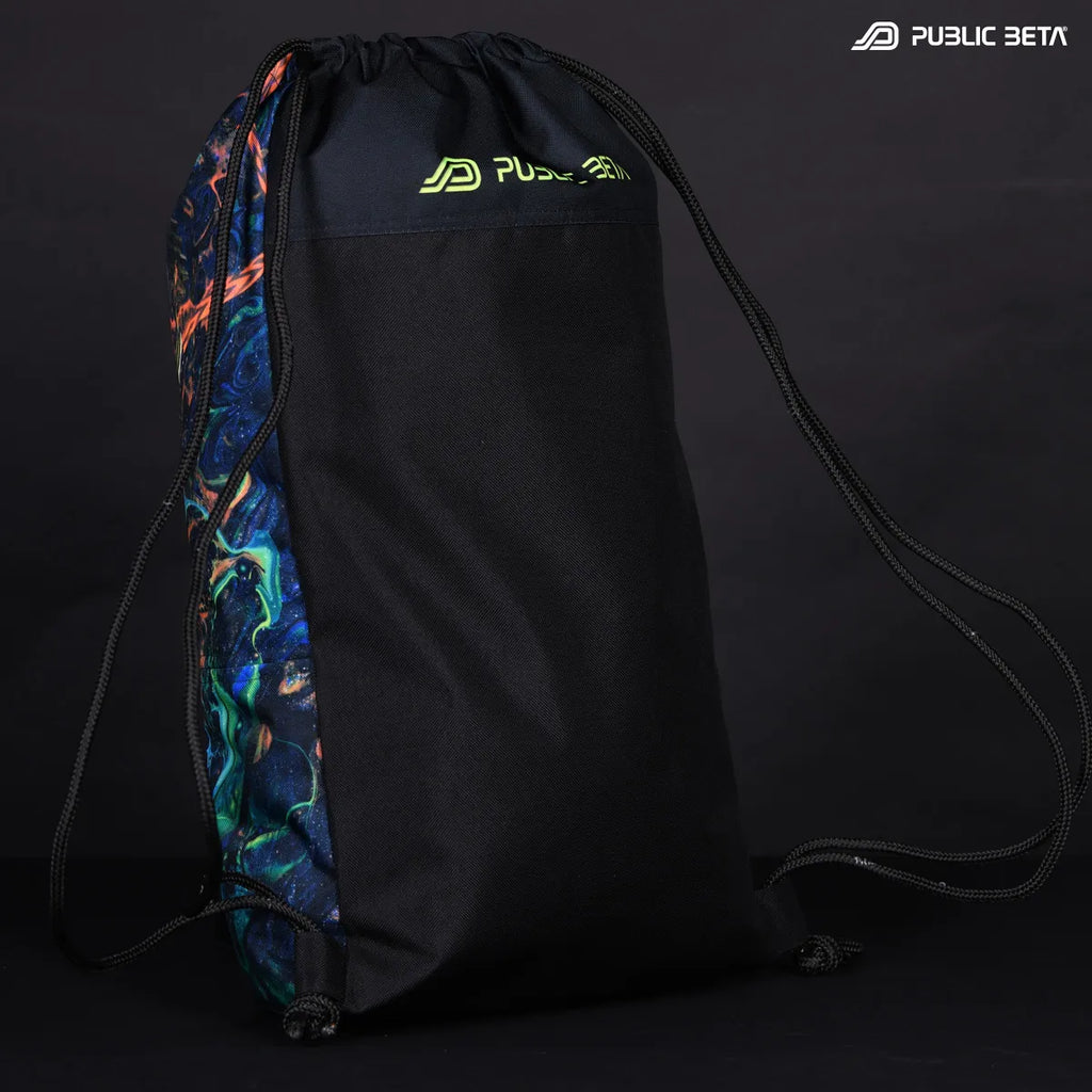 detail of a Drawstring bag with uv reactive psychedelic art print glowing under blacklight