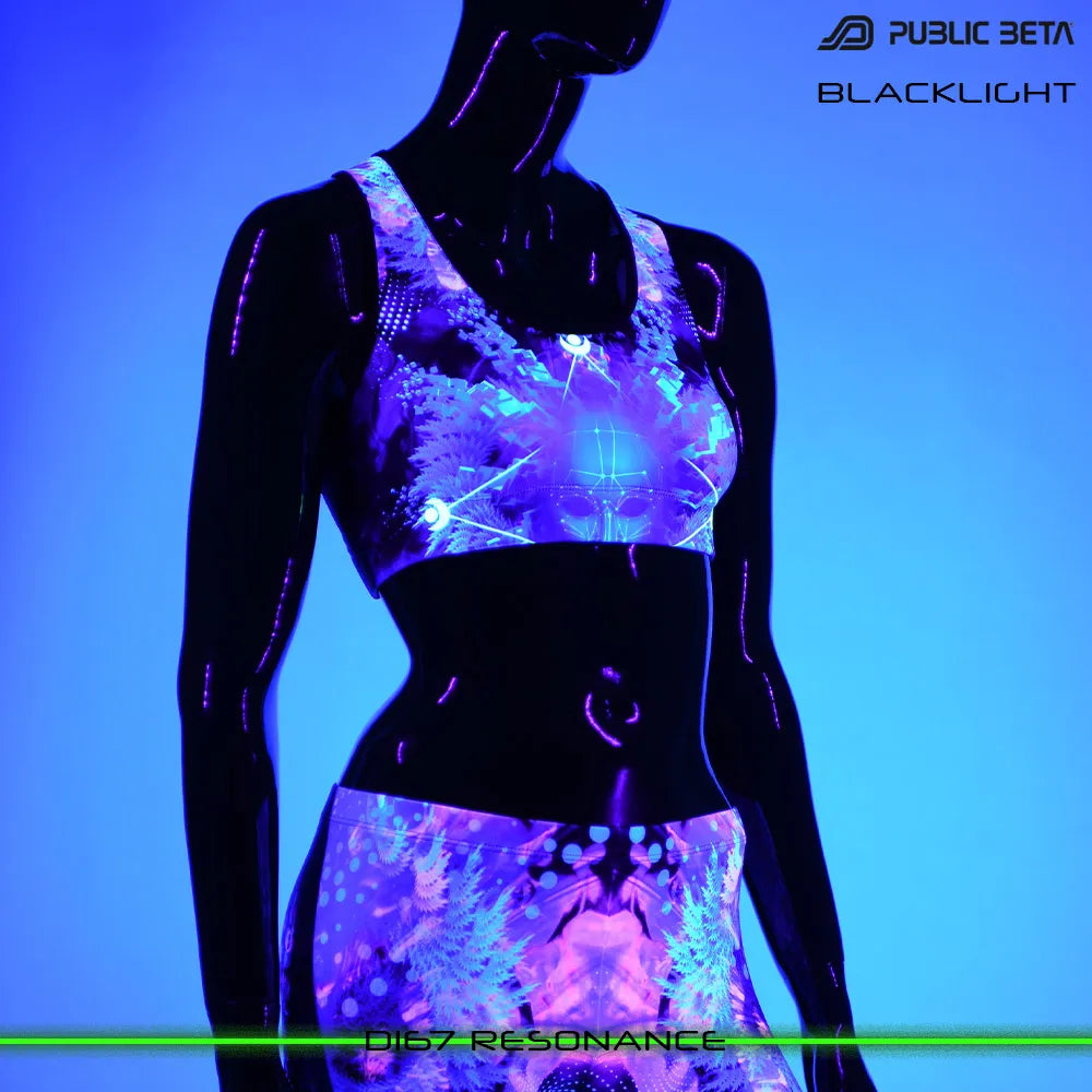 Active top with UV-reactive psychedelic print glowing under blacklight