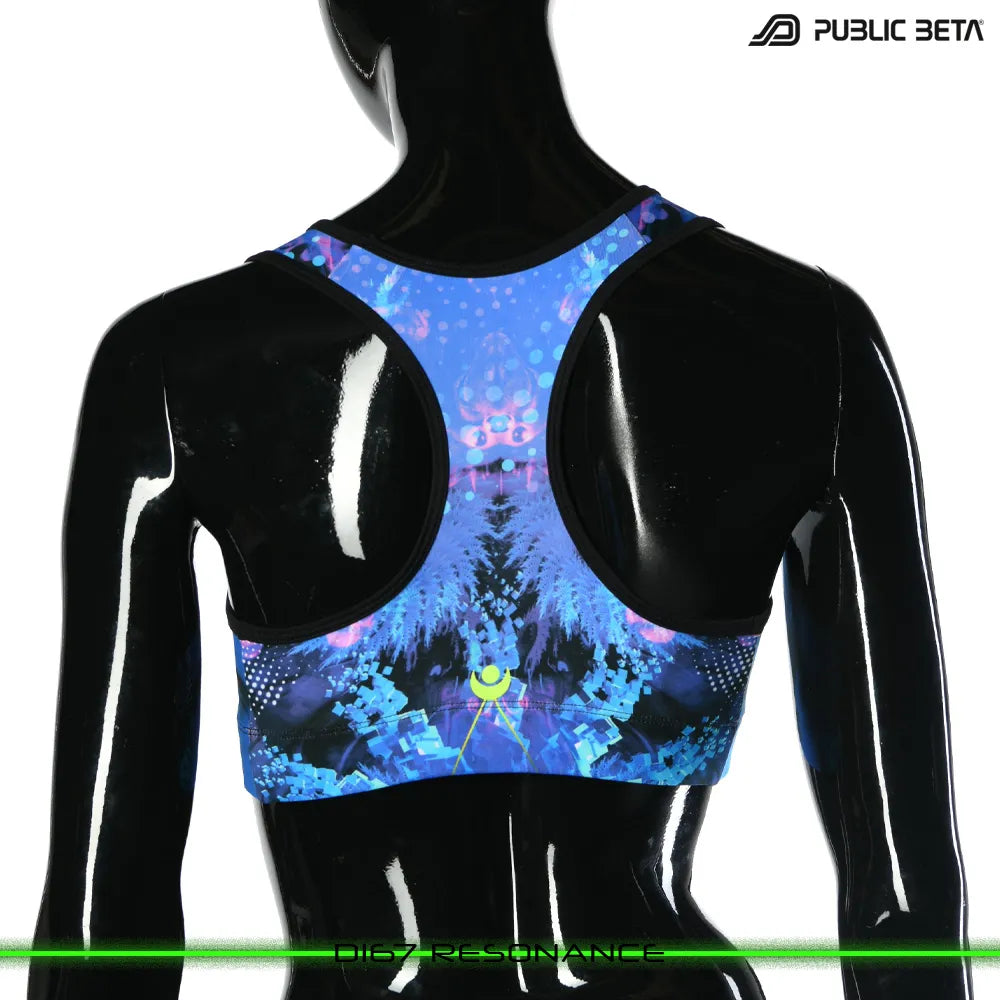 Active top with UV-reactive printed graphics, photographed in natural light