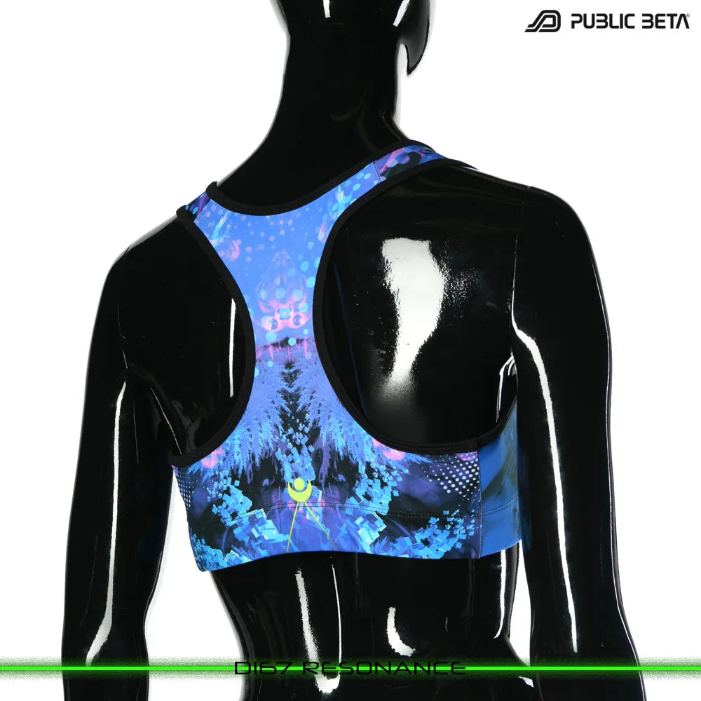 Active top with UV-reactive printed graphics, photographed in natural light
