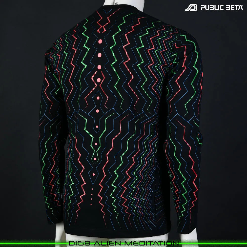 Longsleeve with geometric UV-reactive graphics, photographed in natural light