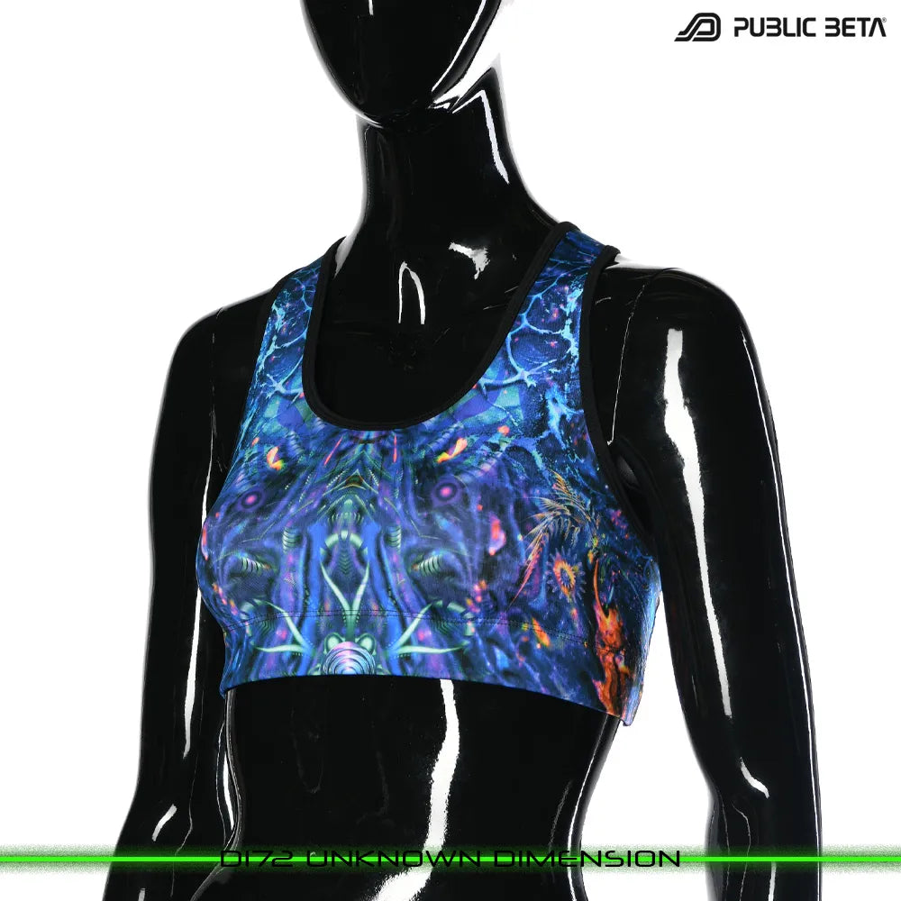 Active top with UV-reactive printed graphics, photographed in natural light
