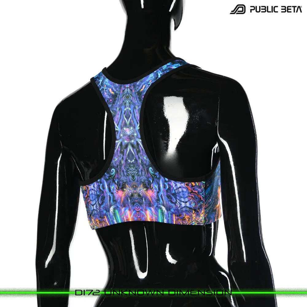 Active top with UV-reactive printed graphics, photographed in natural light