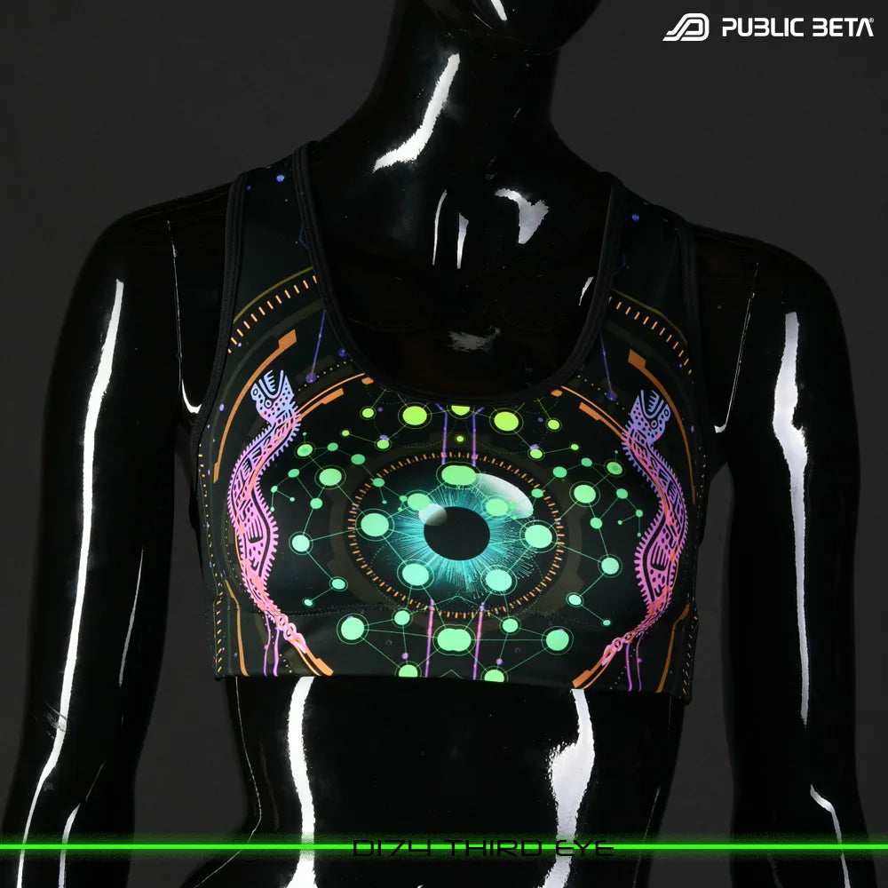 Active top with UV-reactive futuristic graphics, photographed in natural light
