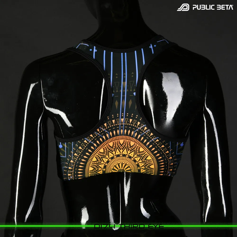 Active top with UV-reactive futuristic graphics, photographed in natural light