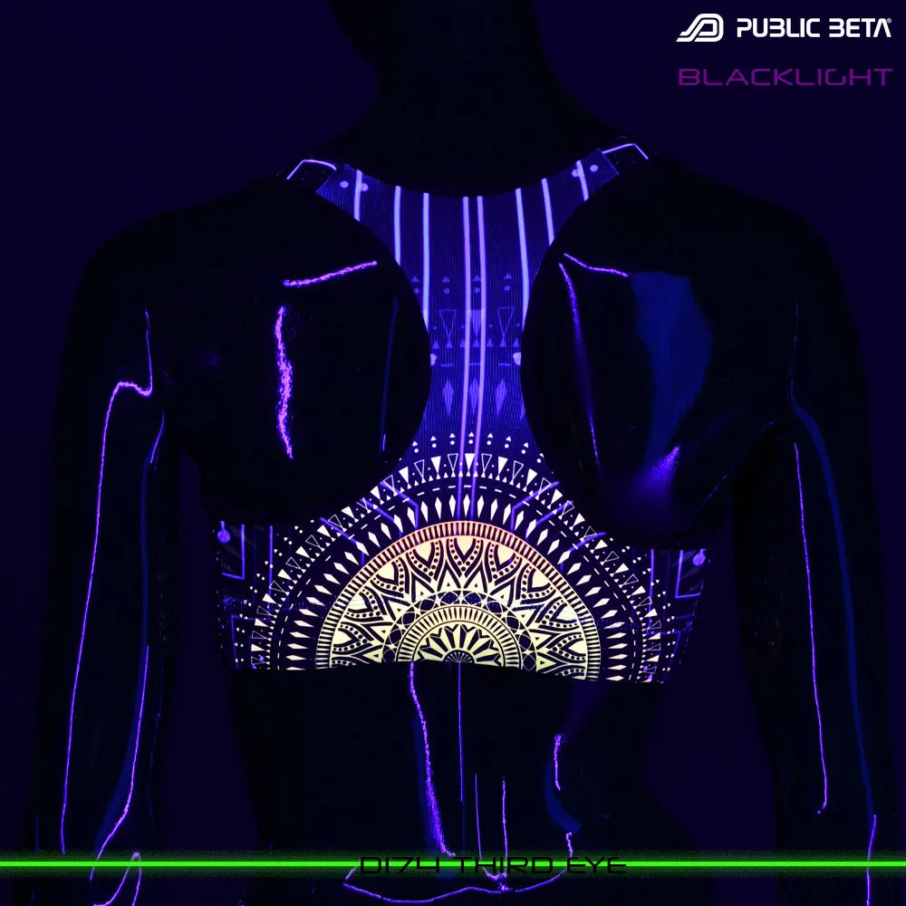 Active top with UV-reactive futuristic print glowing under blacklight