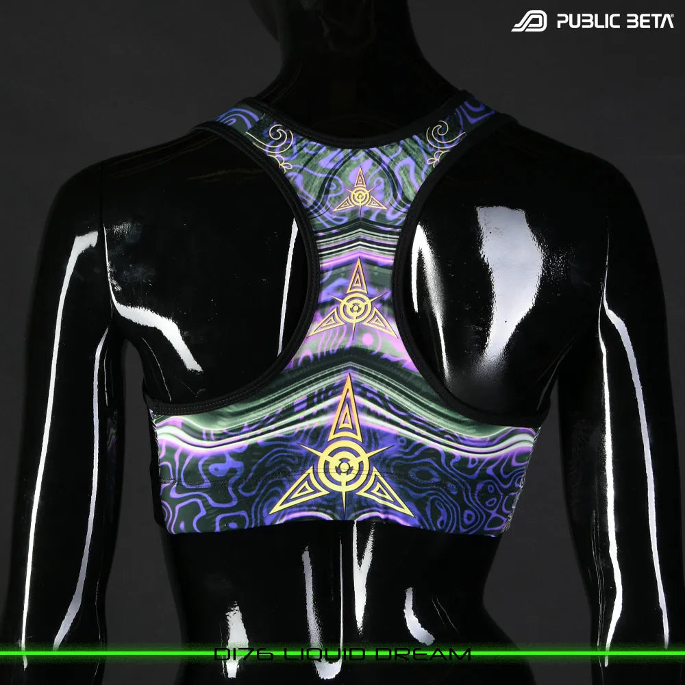 Active top with organic UV-reactive print, photographed in natural light