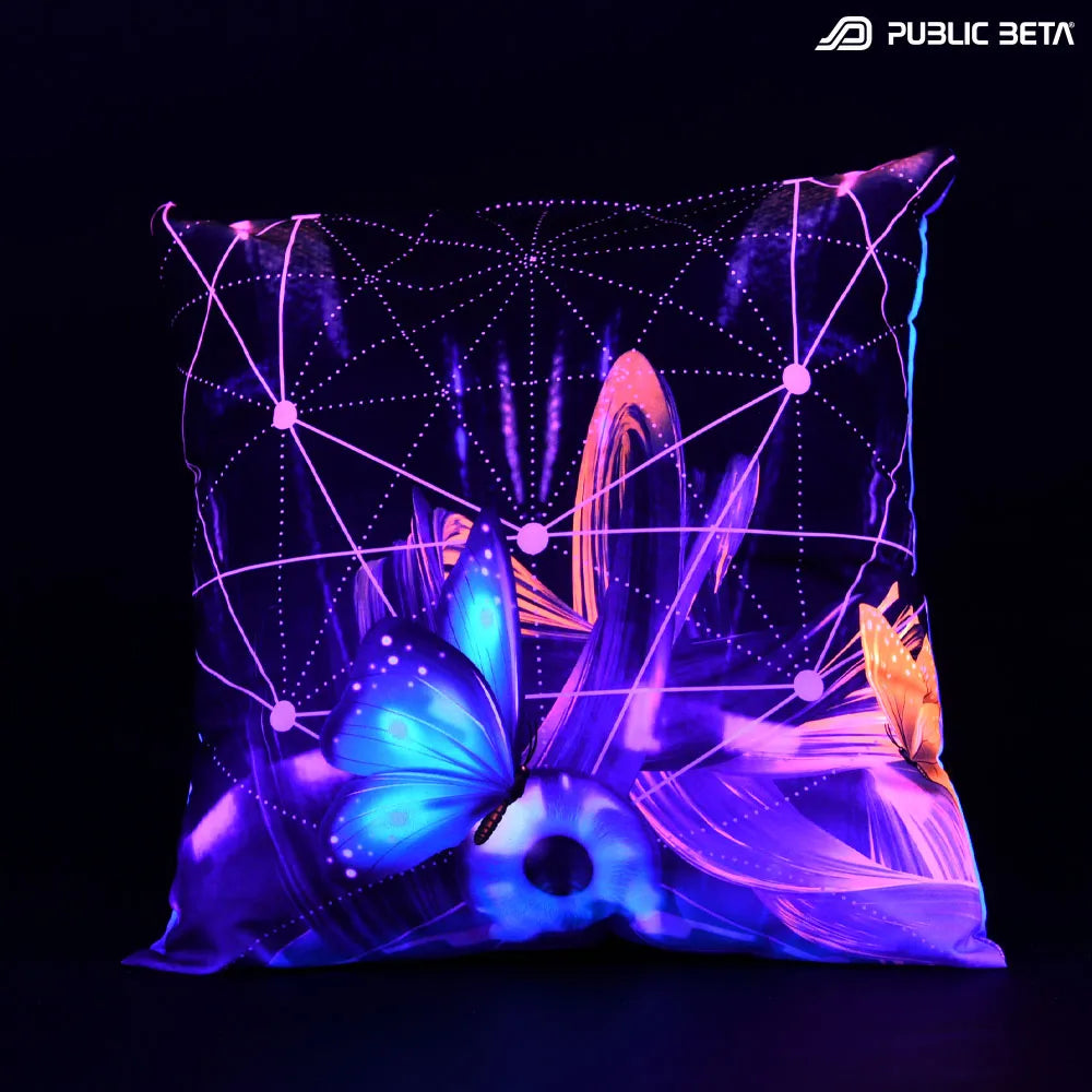 Cushion Cover with UV-reactive graphics glowing under blacklight