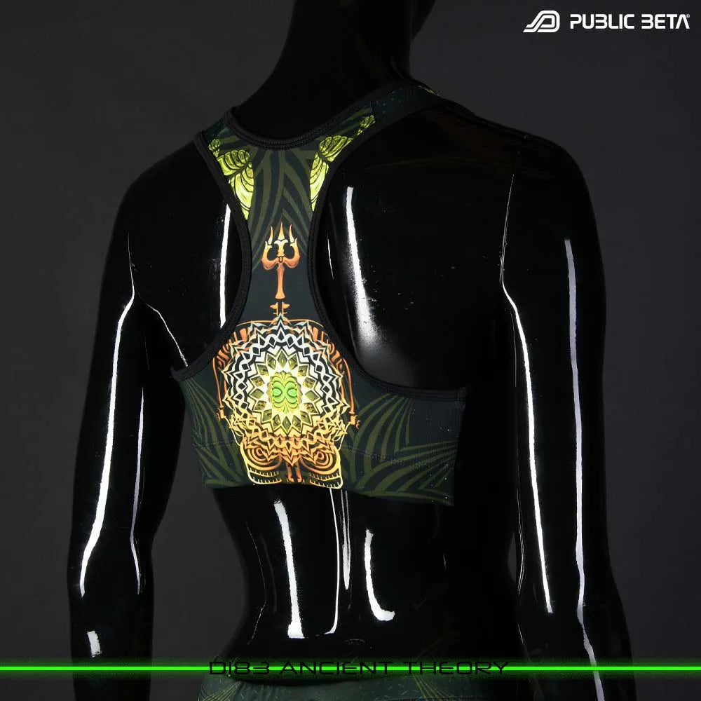 Active top with UV-reactive printed graphics, photographed in natural light