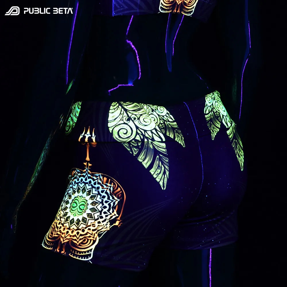 with UV-reactive graphics glowing under blacklight side