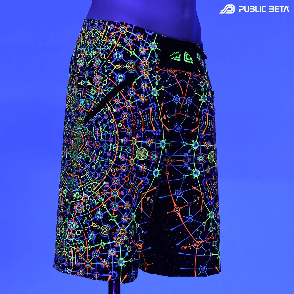 Boardshorts with UV-reactive psychedelic print glowing under blacklight