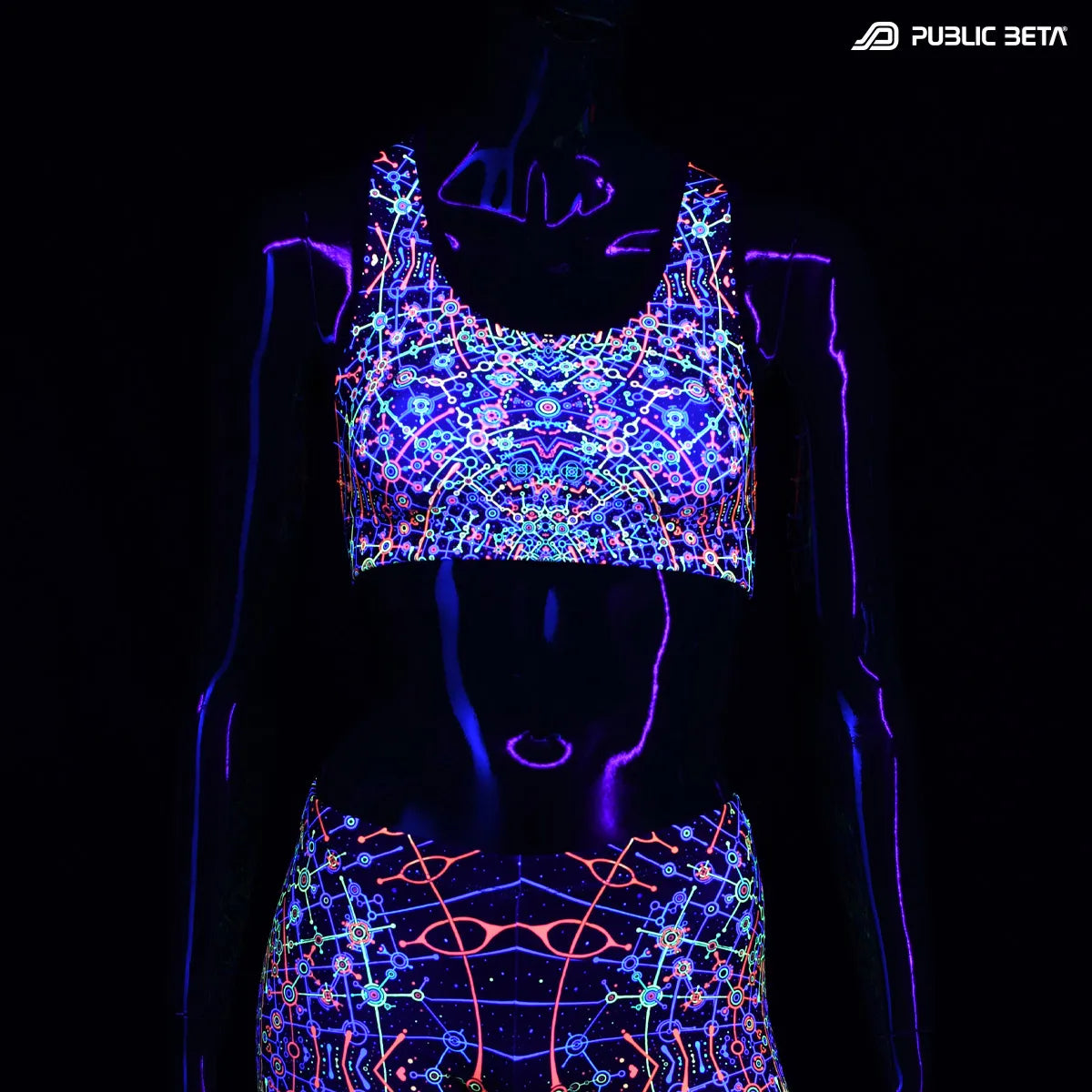 Active top with UV reactive art print glowing under blacklight
