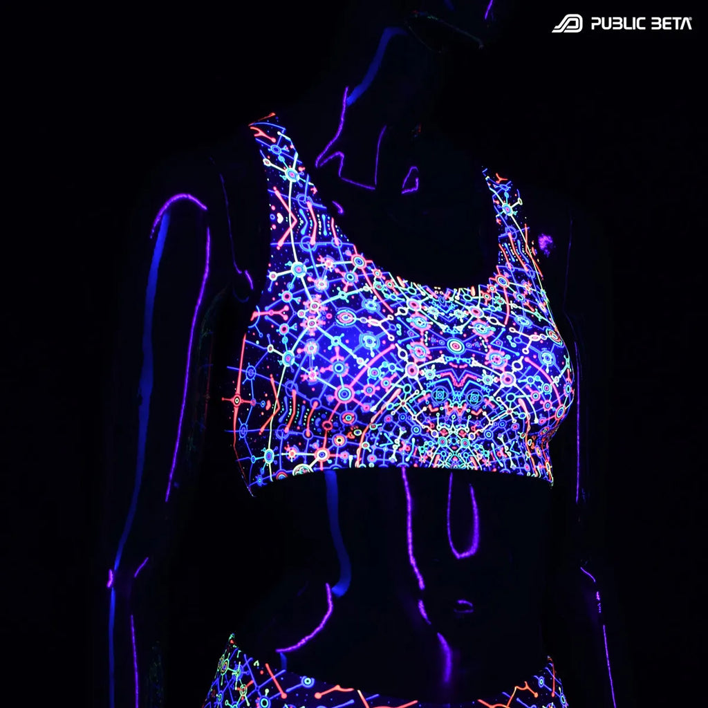 Active top with UV reactive art print glowing under blacklight