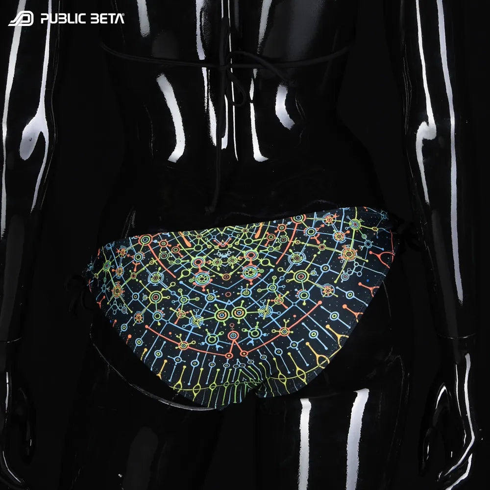 Bikini set with UV-reactive printed graphics, photographed in natural light bottom