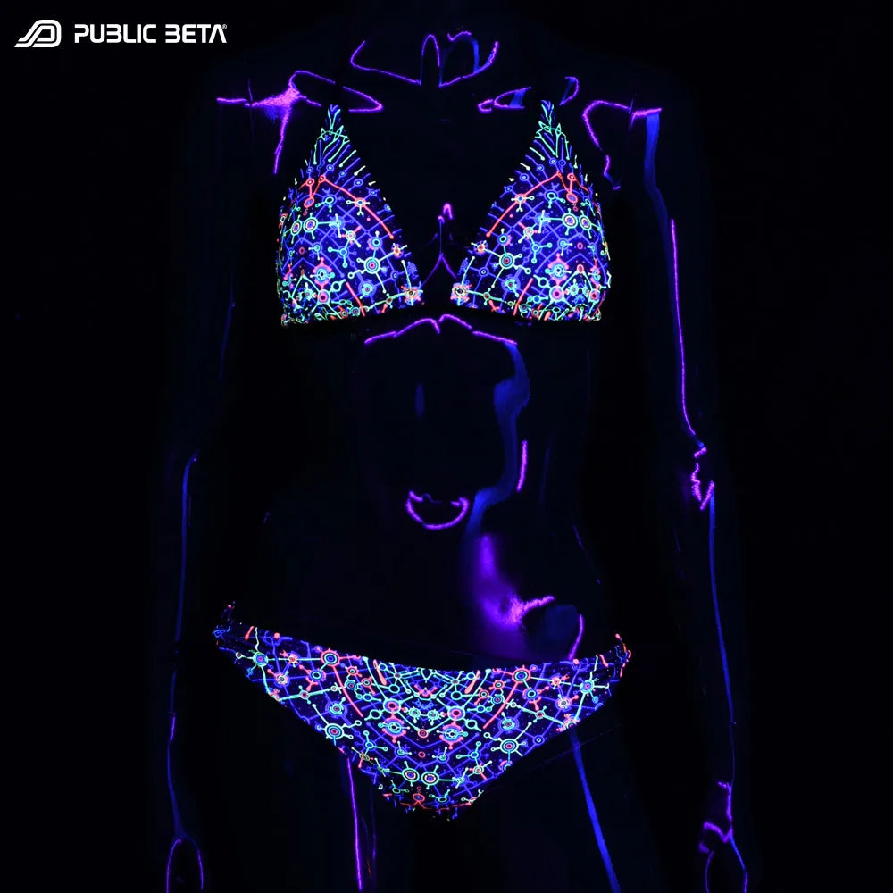Bikini set with UV-reactive graphics glowing under blacklight