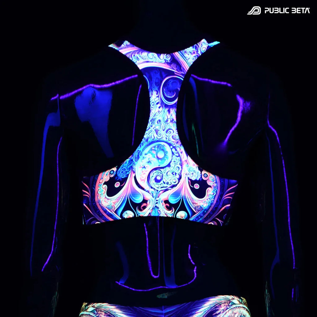 Active top with UV reactive art print glowing under blacklight