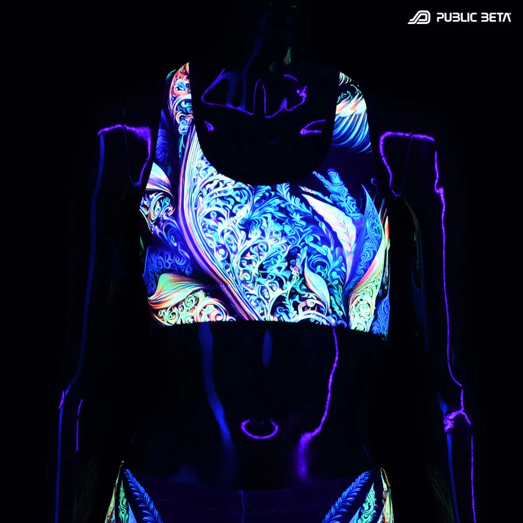 Active top with UV reactive art print glowing under blacklight