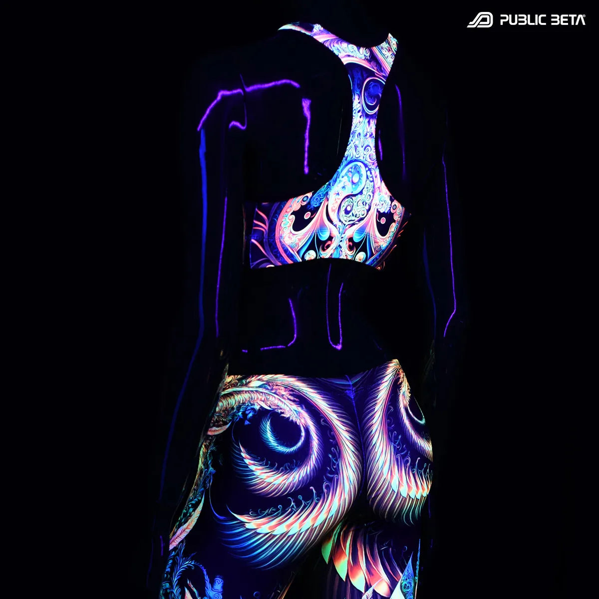 Active top with UV reactive art print glowing under blacklight