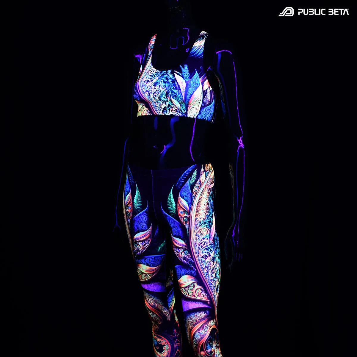 Active top with UV reactive art print glowing under blacklight