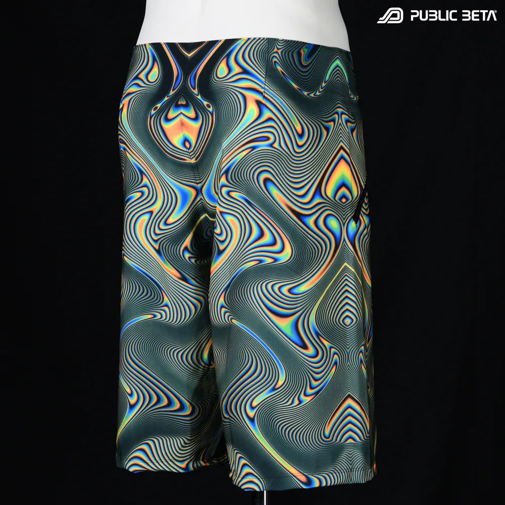 Boardshorts with UV-reactive psychedelic art print, photographed in natural light