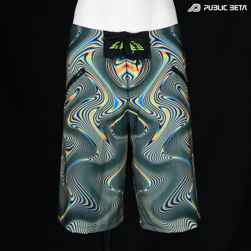 Boardshorts with UV-reactive psychedelic art print, photographed in natural light