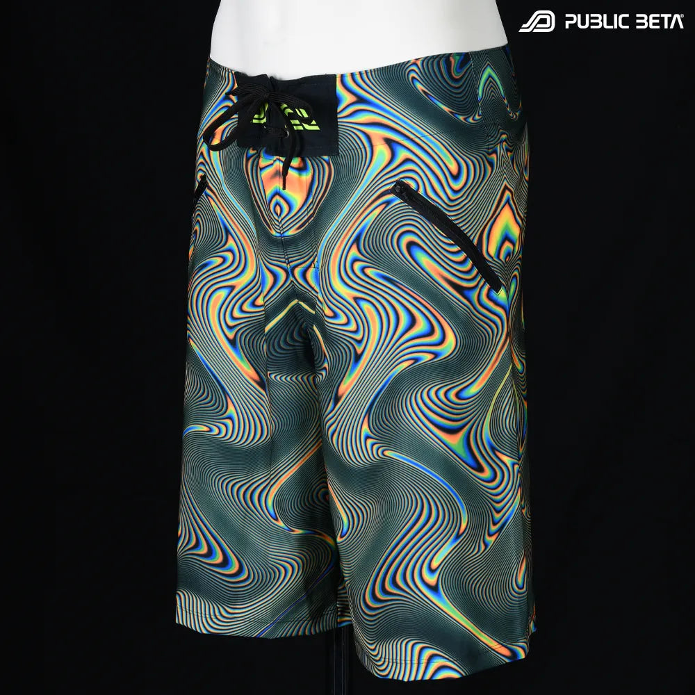 Boardshorts with UV-reactive psychedelic art print, photographed in natural light