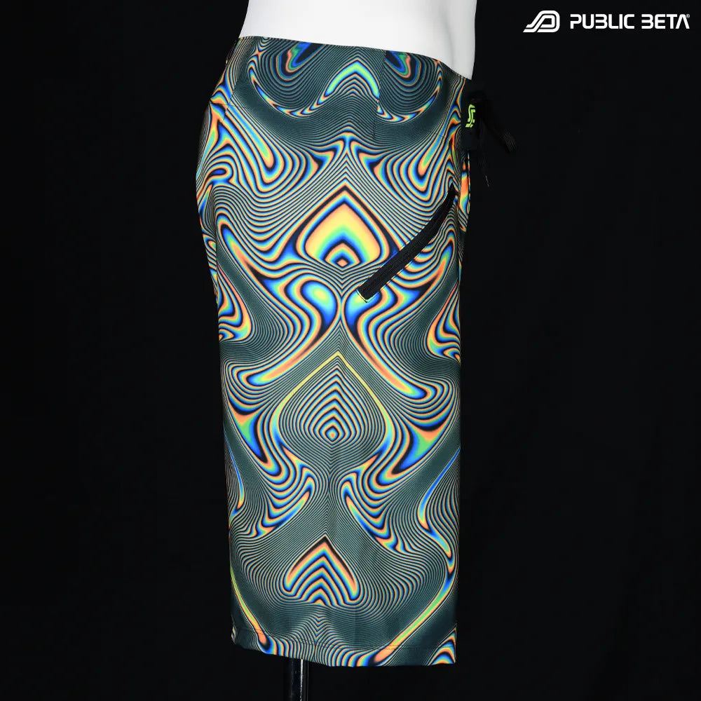 Boardshorts with UV-reactive psychedelic art print, photographed in natural light