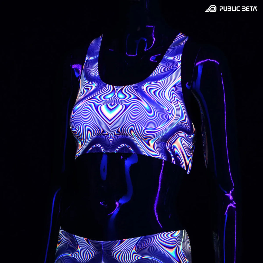 Active top with UV reactive art print glowing under blacklight
