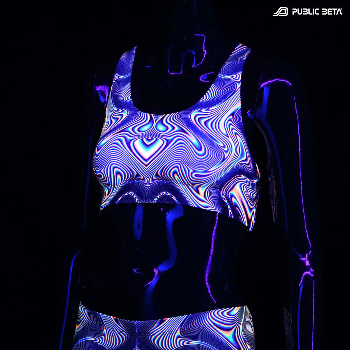Active top with UV reactive art print glowing under blacklight