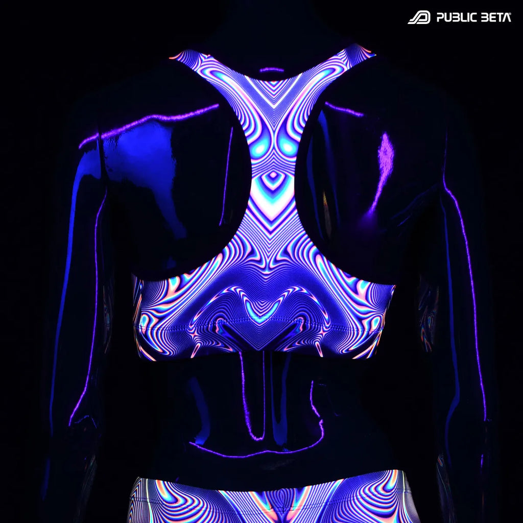 Active top with UV reactive art print glowing under blacklight