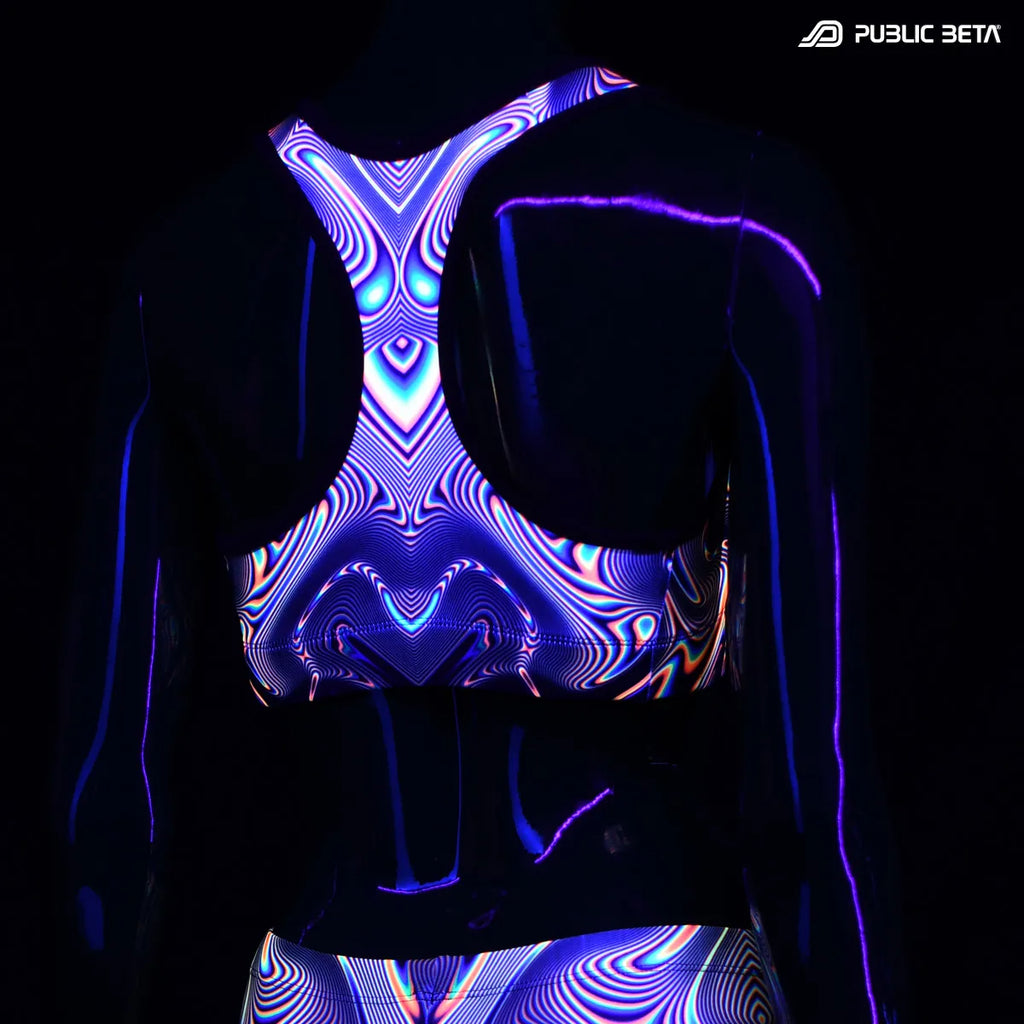 Active top with UV reactive art print glowing under blacklight