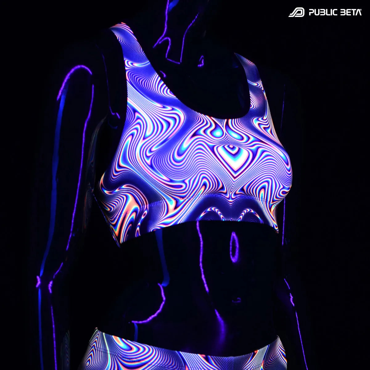 Active top with UV reactive art print glowing under blacklight