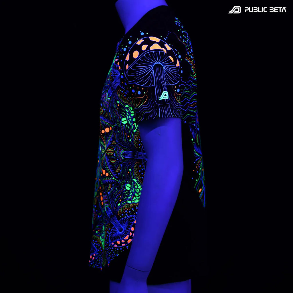 T-shirt with UV reactive psychedelic art print glowing under blacklight