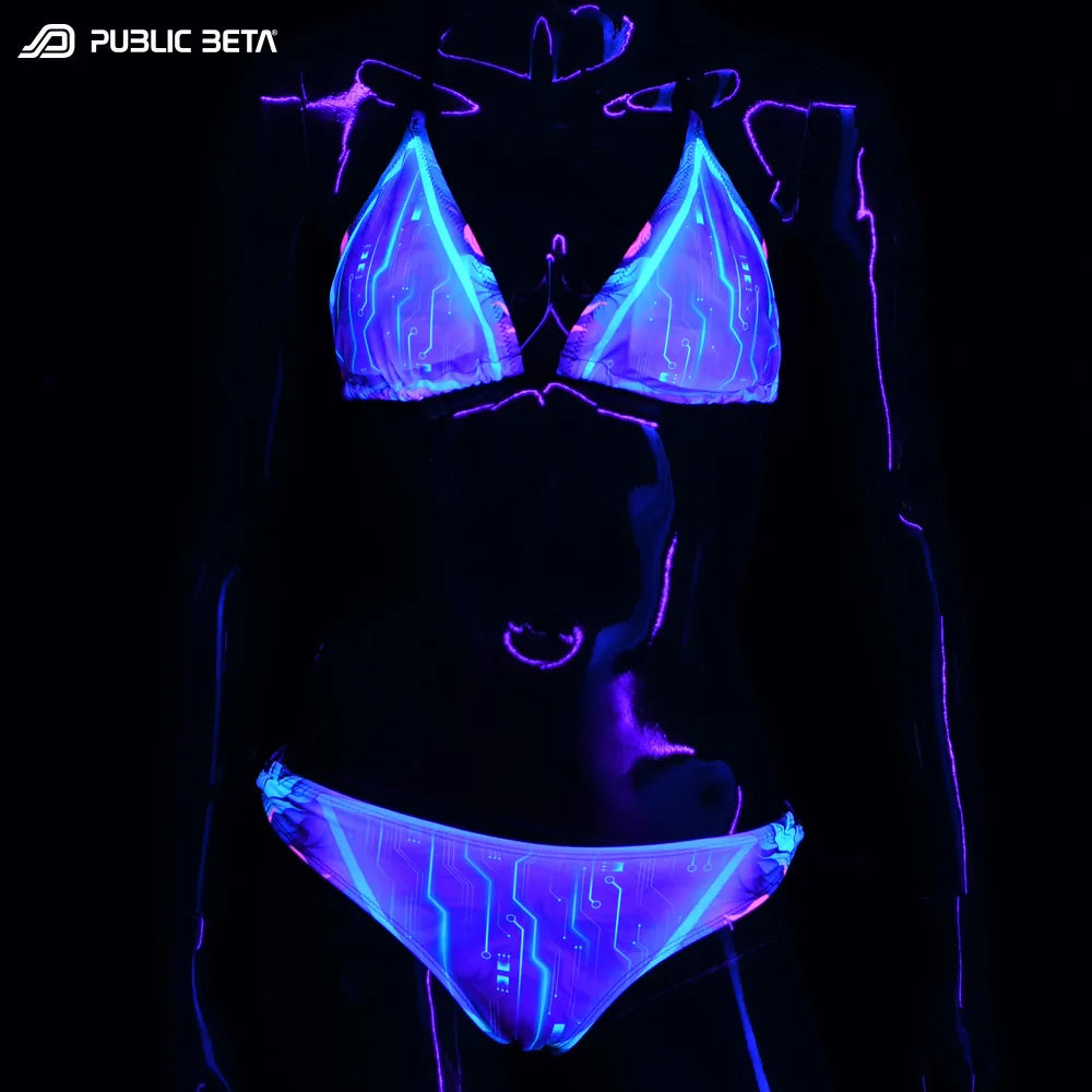 Bikini set with UV-reactive graphics glowing under blacklight front