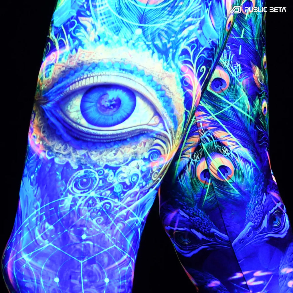 Close up of Leggings with uv reactive art print glowing under blacklight