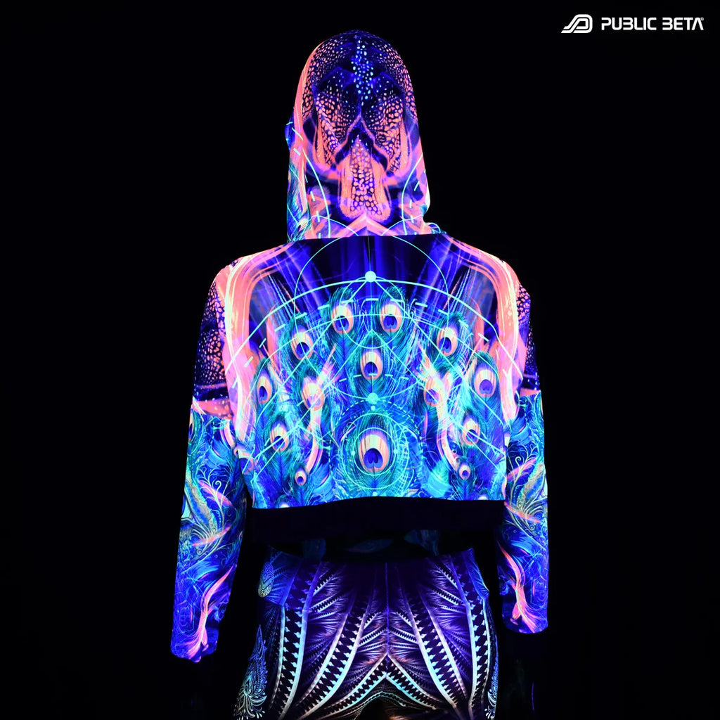 Hooded mesh top with uv reactive psychedelic art print glowing under blacklight