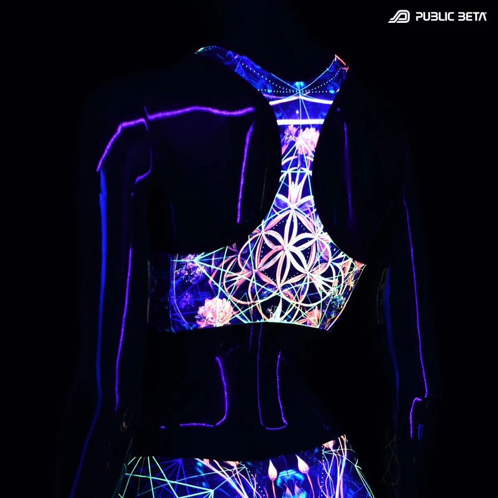 Sports bra with UV reactive print glowing under blacklight