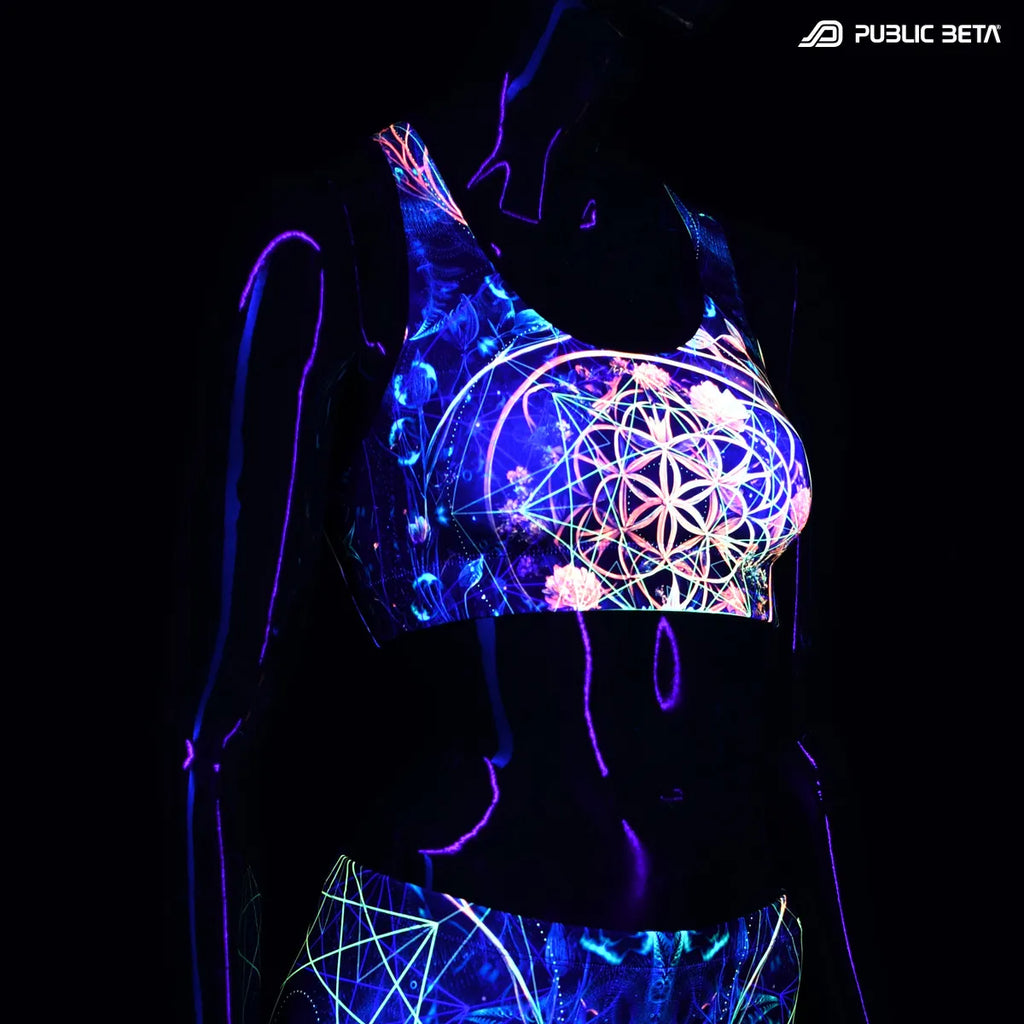 Sports bra with UV reactive print glowing under blacklight