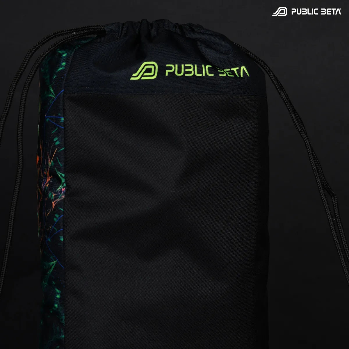 Close up of a Drawstring bag with uv reactive psychedelic art print