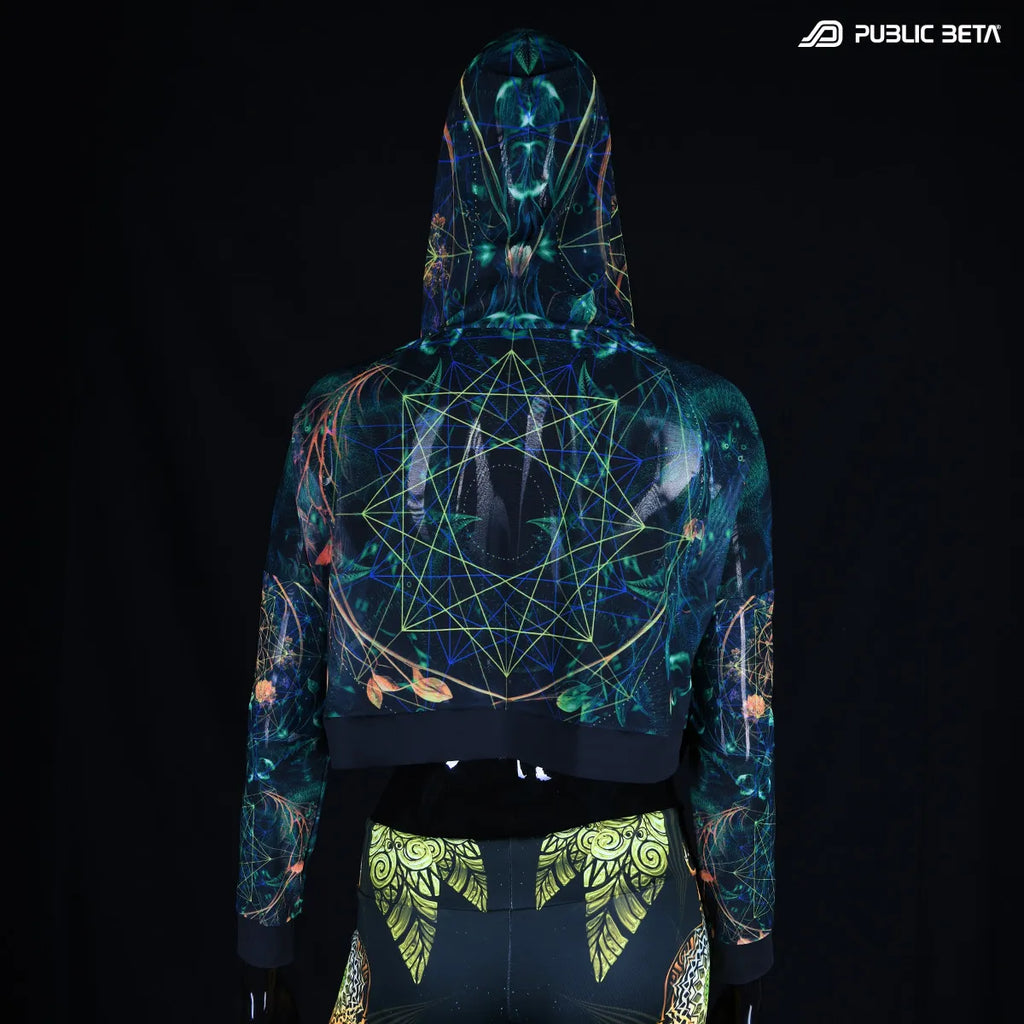 Hooded mesh top with uv reactive psychedelic art print in natural light