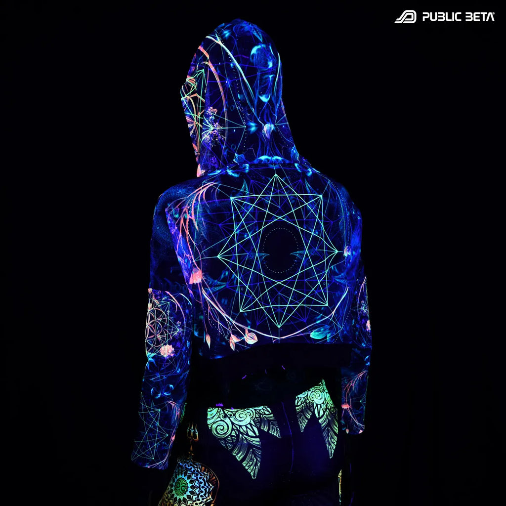 Hooded mesh top with uv reactive psychedelic art print glowing under blacklight