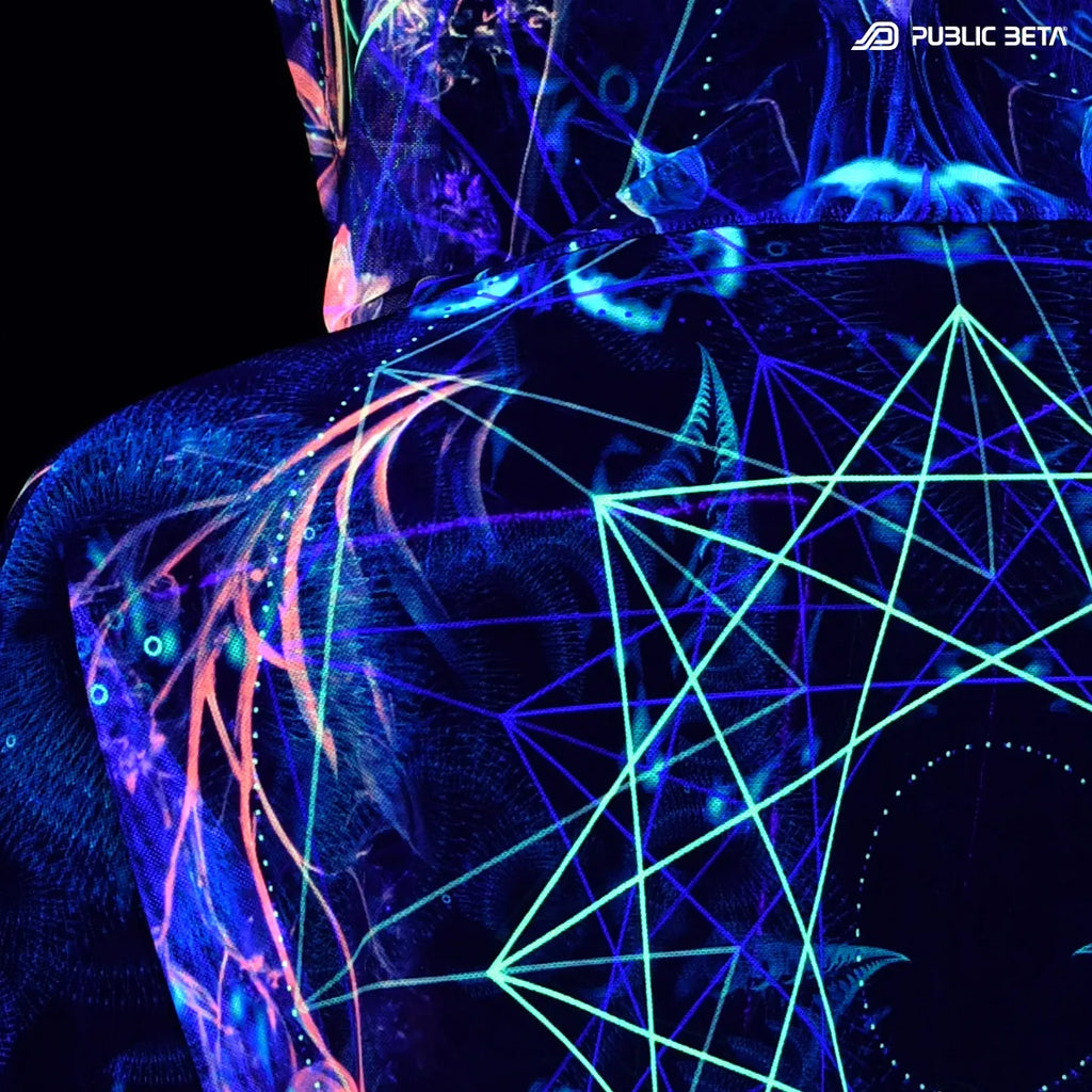 Close up of a Hooded mesh top with uv reactive psychedelic art print glowing under blacklight