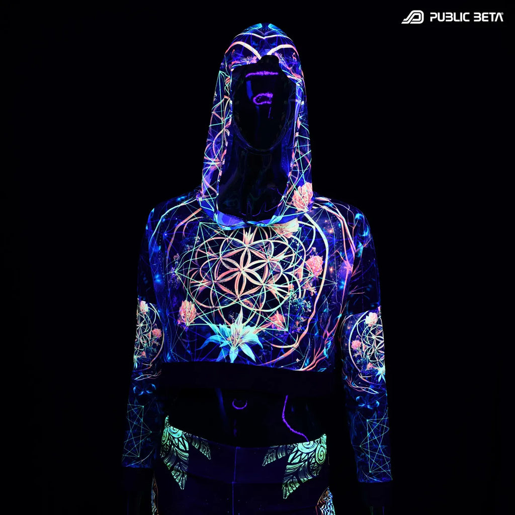 Hooded mesh top with uv reactive psychedelic art print glowing under blacklight
