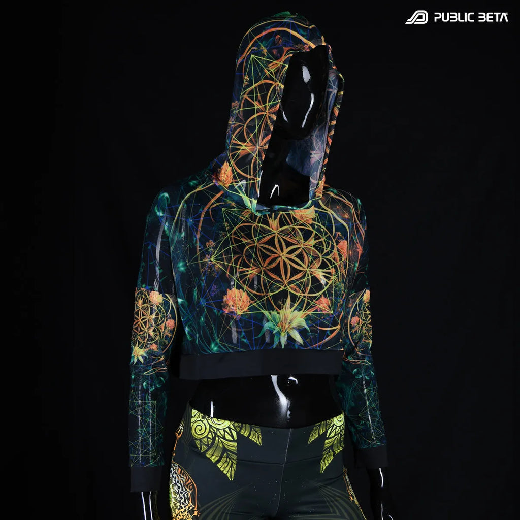 Hooded mesh top with uv reactive psychedelic art print in natural light