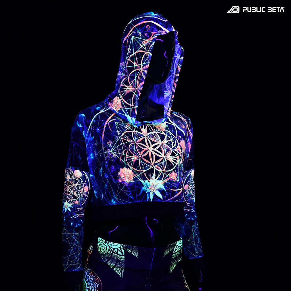 Hooded mesh top with uv reactive psychedelic art print glowing under blacklight