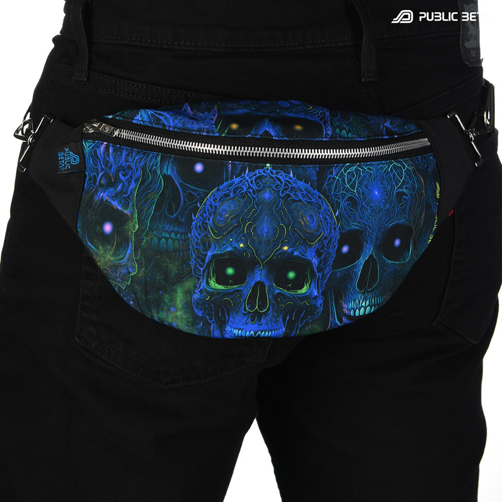Bum bag with blue tribal skulls print, photographed in natural light