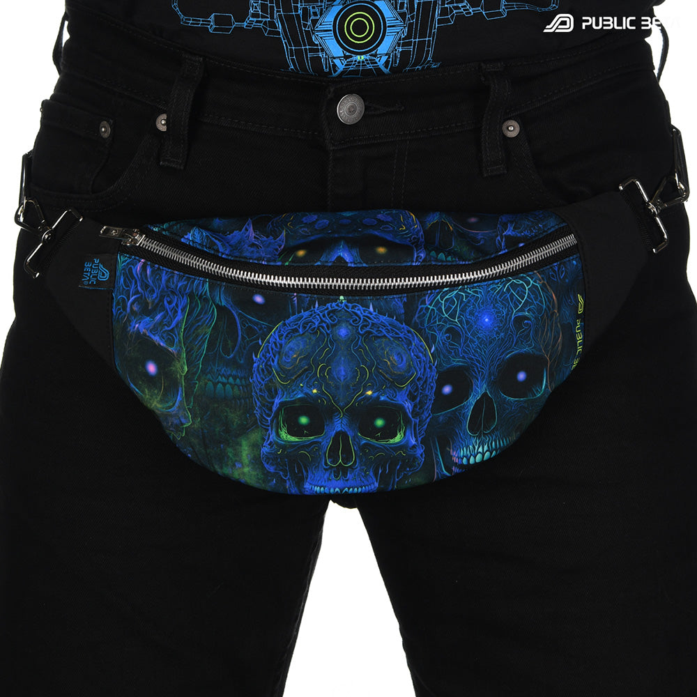 Bum bag with blue tribal skulls print, photographed in natural light