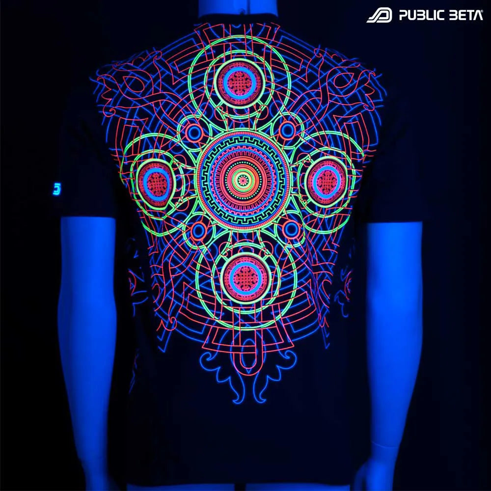 T-shirt with geometric UV-reactive graphics glowing under blacklight