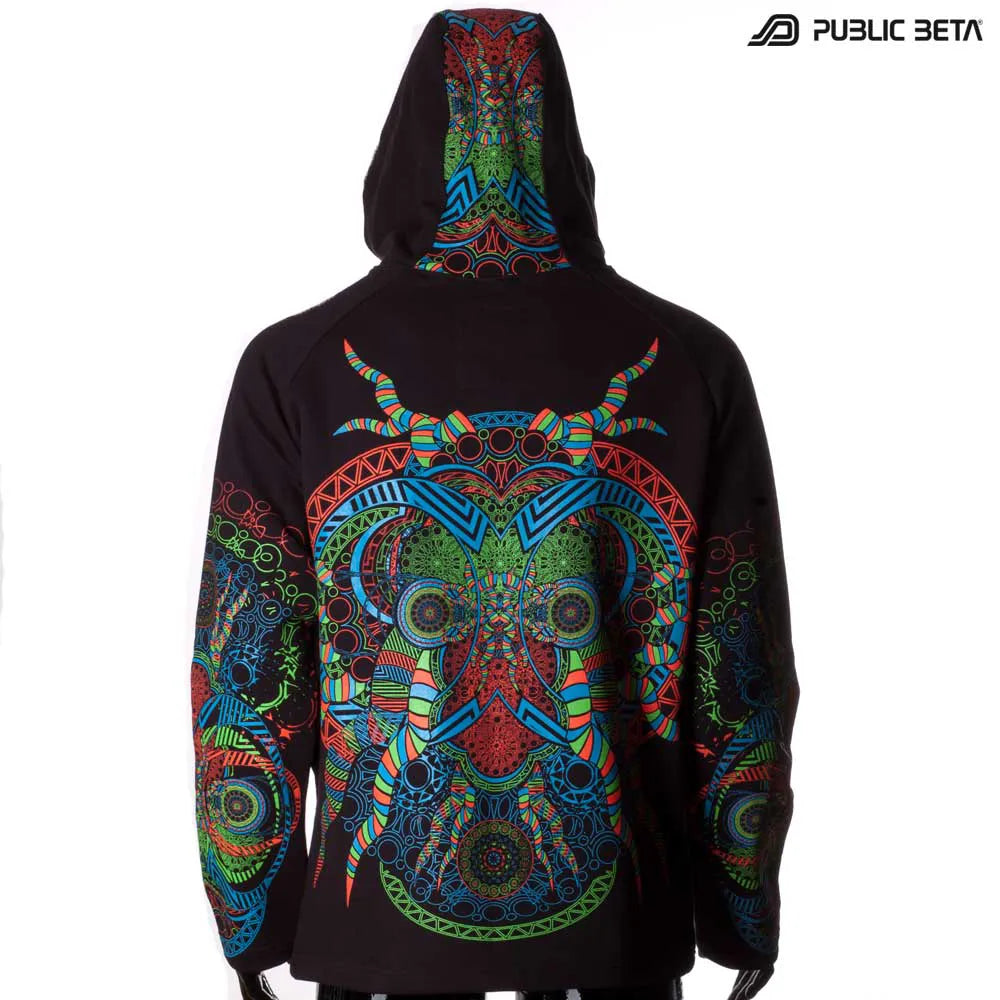Hooded sweater with UV-reactive printed graphics, photographed in natural light