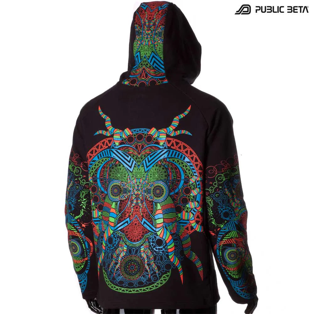 Hooded sweater with UV-reactive printed graphics, photographed in natural light